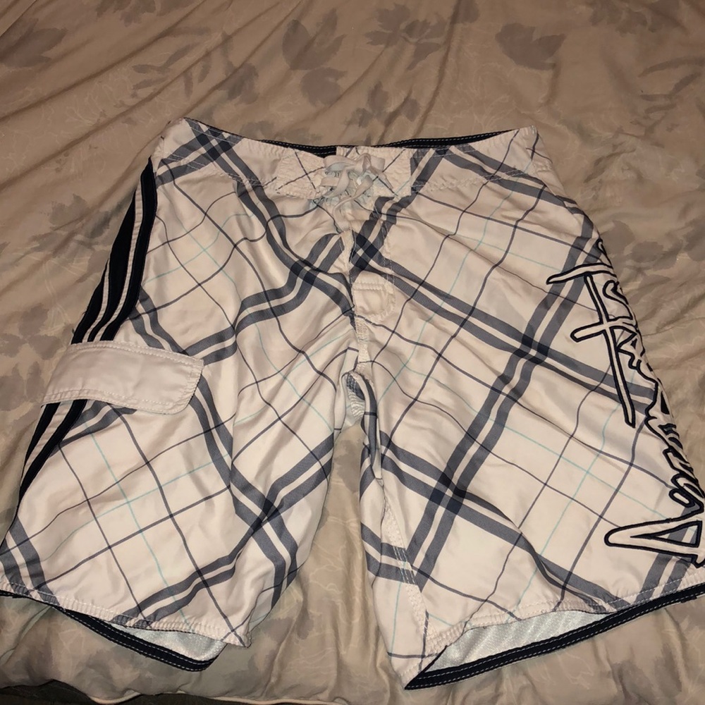 Plaid swim trunks
